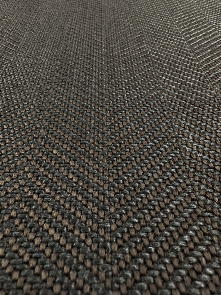 Close-up of the Upholstery - Montpellier 15 - 145cm by Super Cheap Fabrics, showing its detailed herringbone weave in dark brown and black, reminiscent of premium Australian upholstery fabric.
