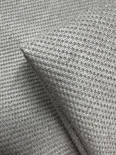 Close-up of Twill Upholstery - Rex 370 - 150cm by Super Cheap Fabrics, featuring a textured silver basket-weave pattern and subtle sheen—ideal deadstock upholstery from an Australian wholesaler.
