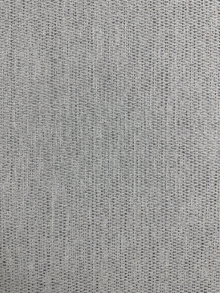 Close-up of Super Cheap Fabrics’ Upholstery - Bacchus Silver (145cm), a light gray premium Australian fabric with a subtle, textured weave forming a soft, grid-like look—perfect for sophisticated upholstery and high-end textile projects.