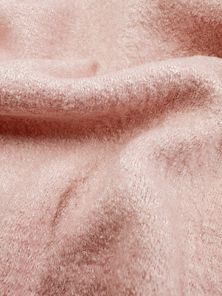 Close-up of Boiled Wool fabric in Powder Pink by Super Cheap Fabrics, featuring soft folds and a cozy, fuzzy texture. Width: 145cm.