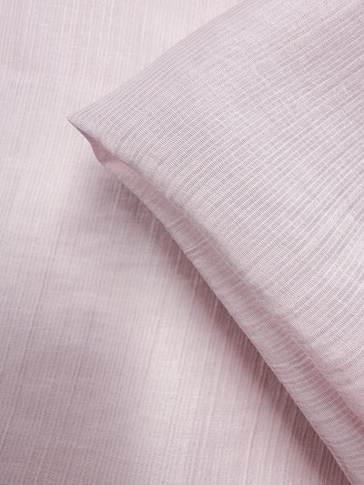 Close-up of Super Cheap Fabrics' Textured Designer Voile - Carinaria (155cm): lightweight cotton with a soft, smooth feel and delicate textured lines. One piece folded over another creates gentle shadows—ideal for sheer summer dresses.
