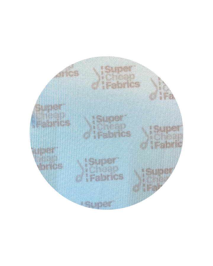 A close-up of Plain Mesh - Aqua Splash - 165cm by Super Cheap Fabrics, featuring aqua polyester mesh with a subtle repeating logo pattern, displayed in a circular frame on a white background.